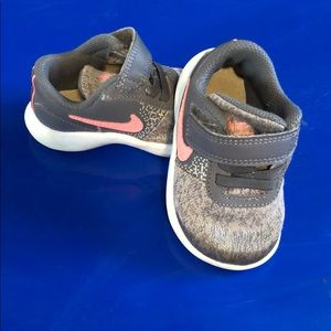 Grey and pink Nike baby shoes